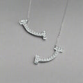 18K T Smile Diamonds Earrings