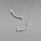 18K T Smile Diamonds Earrings