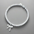 18K T Bow Charm Bead Bracelet