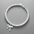 18K T Bow Charm Bead Bracelet