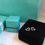 18K T Diamond Earrings